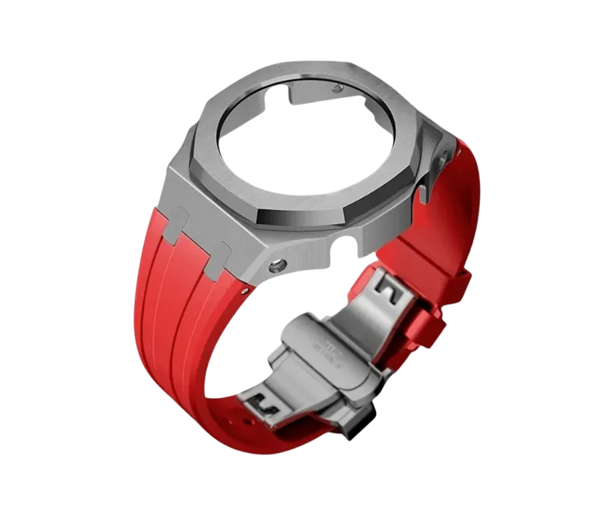 Bracelet de montre en silicone rouge avec boîtier en acier inoxydable argenté et boucle déployante, offrant un style sportif et moderne.