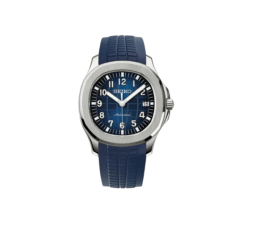 Montre Seiko avec cadran bleu texturé, index et chiffres blancs, guichet de date à 3 heures, boîtier en acier inoxydable et bracelet en silicone bleu.