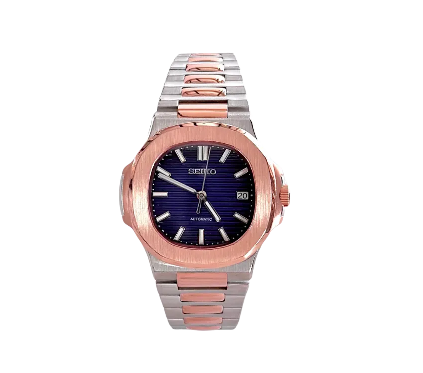 Montre Seiko automatique avec un cadran bleu profond, boîtier en acier inoxydable et lunette en or rose brossé, bracelet bicolore en acier inoxydable et or rose, avec affichage de la date.