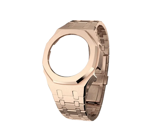 Boîtier de montre en acier inoxydable finition or rose, accompagné d'un bracelet en métal assorti pour un style raffiné et luxueux.