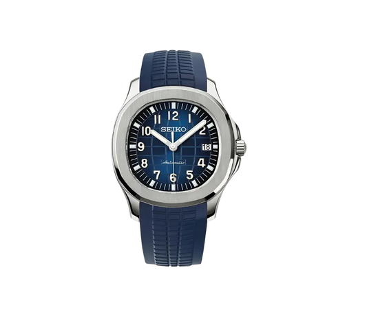 Montre Seiko avec cadran bleu texturé, index et chiffres blancs, guichet de date à 3 heures, boîtier en acier inoxydable et bracelet en silicone bleu.