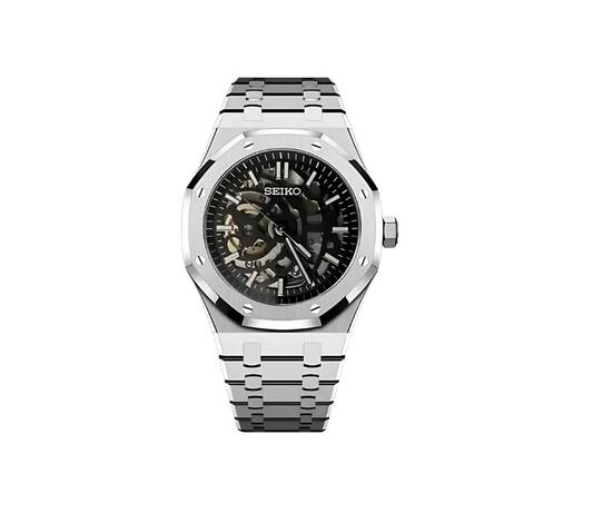 
Montre Seiko automatique avec cadran squelette noir, dévoilant le mécanisme interne, boîtier octogonal et bracelet en acier inoxydable. Un design technique et élégant pour les amateurs d'horlogerie raffinée.