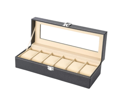Boîte de rangement en cuir noir avec intérieur en velours beige, dotée de 6 compartiments rembourrés et d'un couvercle transparent, idéale pour protéger et organiser les montres de luxe.